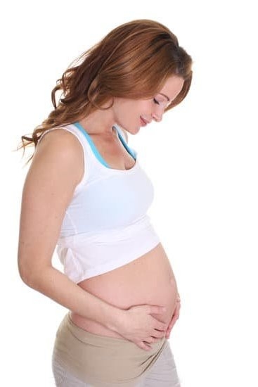 brown discharge in early pregnancy 4 weeks in hindi